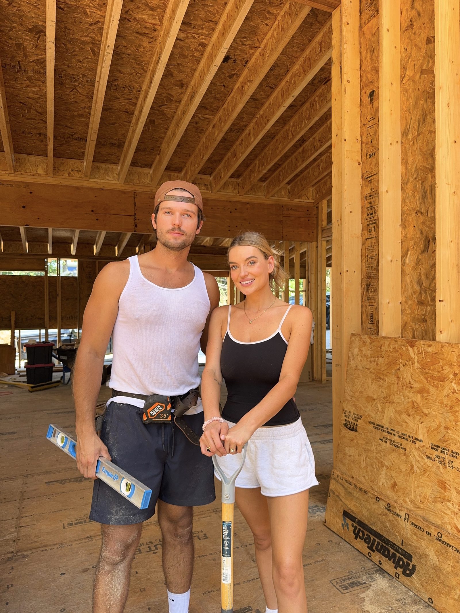 The two of us inside the house we framed on our land